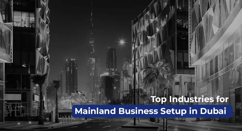 Dubai cityscape at night showcasing business hubs, highlighting top industries ideal for mainland business setup in Dubai.