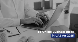 Entrepreneur typing on laptop surrounded by parcels representing top online business ideas in UAE for 2025