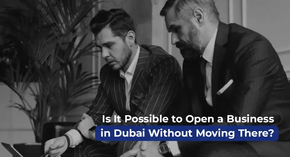 Two businessmen discussing remote company formation options in Dubai – open a business in Dubai without relocating