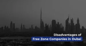 Dubai skyline with overlay text highlighting the disadvantages of free zone companies in Dubai, including limited mainland access and higher business costs.